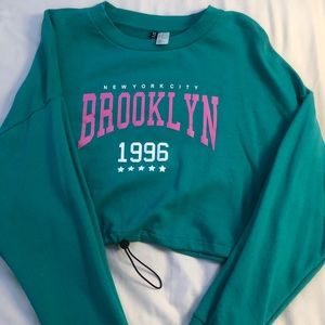 Teal Cropped sweatshirt (NEVER WORN)